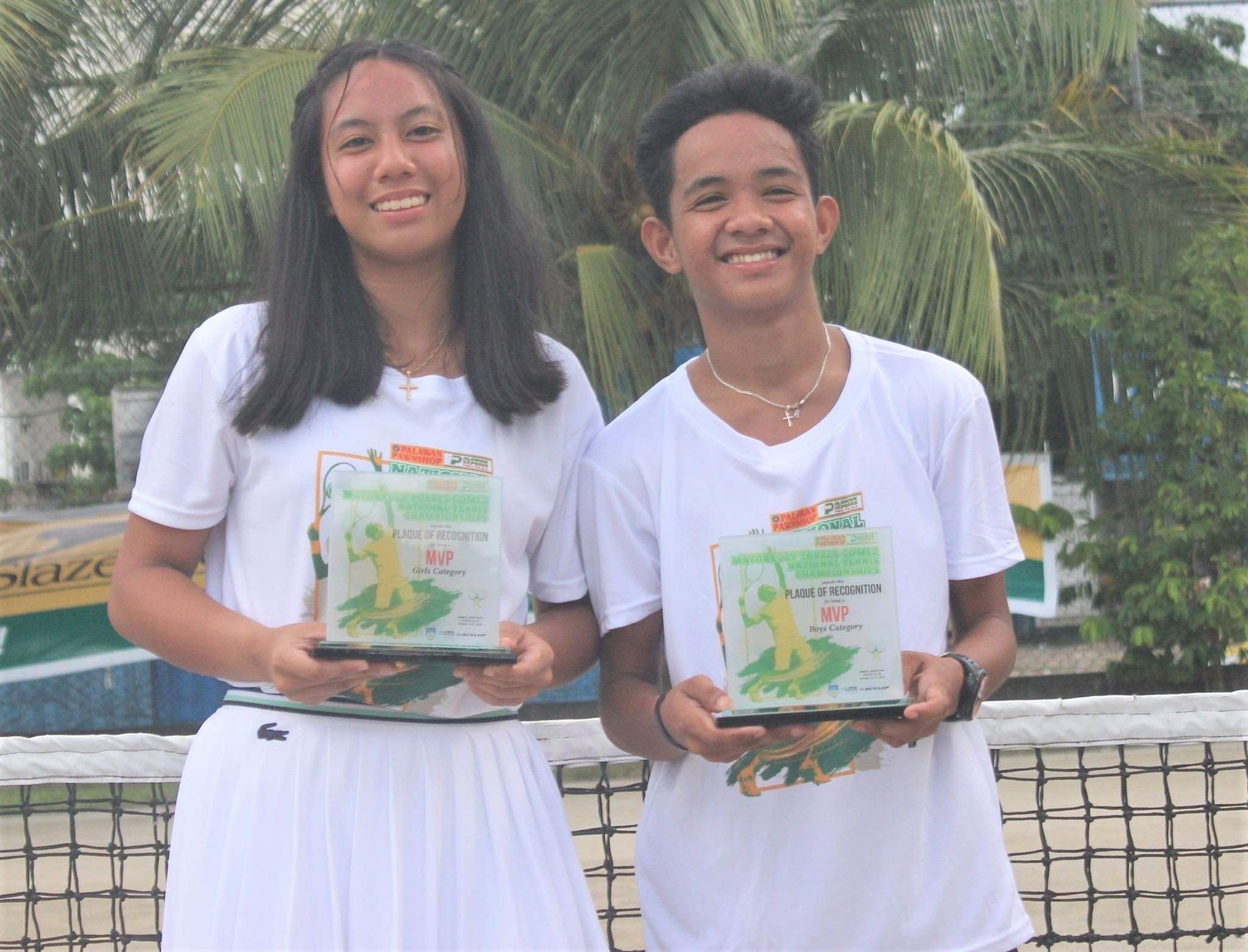 PHOTOGRAPH COURTESY OF PPS
Kimi Brodeth (left), posing with fellow winner Gerald Gemida, enhances a promising career with a ‘twinkill’ at home.