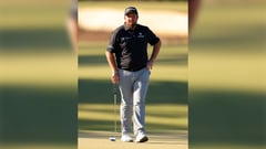 Lowry leads after buying new putter