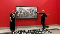 Protesters glue hands on Picasso painting