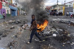 Gang fighting, demonstrations rock Haiti