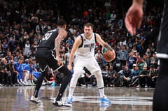 Doncic triple-double  as Mavs edge Nets