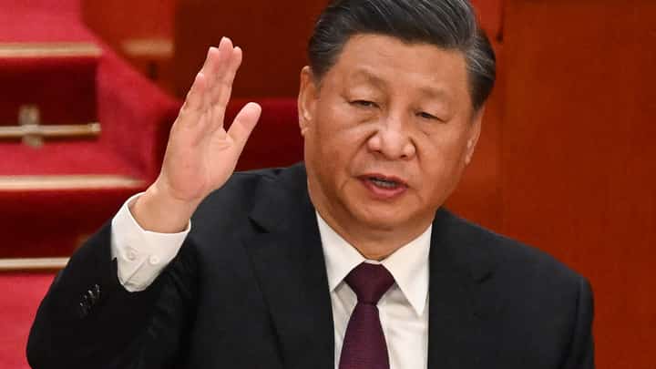 China's President Xi Jinping attends the closing ceremony of the 20th Chinese Communist Party's Congress at the Great Hall of the People in Beijing on 22 October 2022. (Photo by Noel CELIS / AFP)