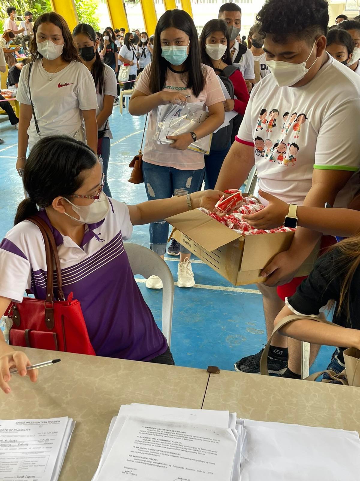 Indigents in Bustos, Bulacan assisted by Bong Go
