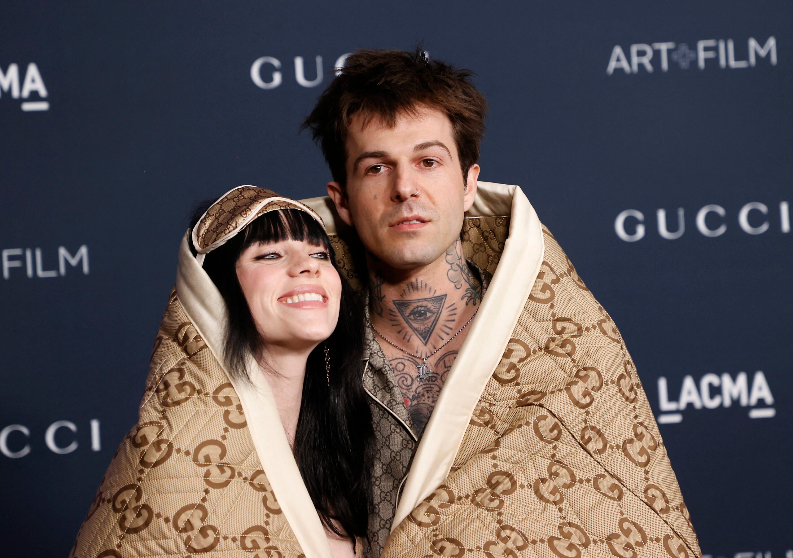 Michael Tran/Agence 
France-Presse
Billie Eilish and Jesse Rutherford draped in a Gucci blanket.