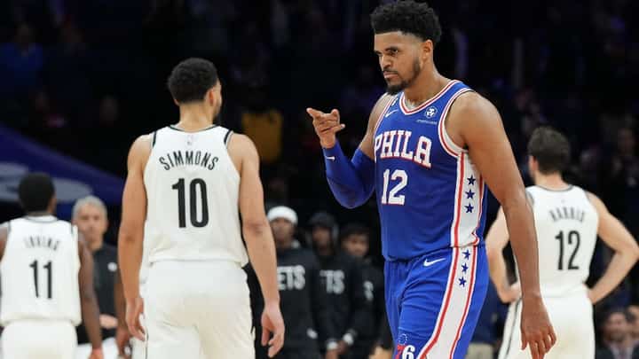 Tobias Harris of the Philadelphia 76ers reacts in front of Ben Simmons of the Brooklyn Nets in the fourth quarter of the game at the Wells Fargo Center on November 22, 2022 in Philadelphia, Pennsylvania. The 76ers defeated the Nets 115-106. Photo by Mitchell Leff / GETTY IMAGES NORTH AMERICA / Getty Images via AFP