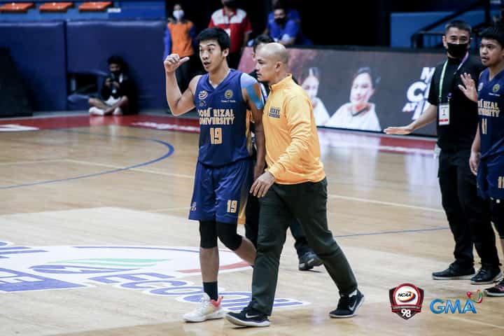 John Amores of Jose Rizal University threw punches against Benilde players on Tuesday, 8 November. Photo courtesy of NCAA