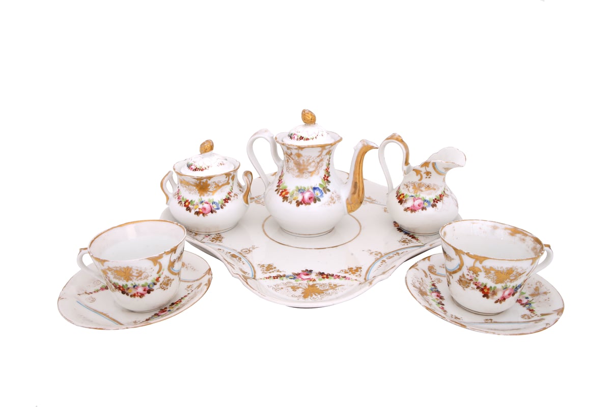 Vieux Parisien Porcelain Coffee Set. French, 19th century. Parcel-gilt and hand-painted with polychromed flowers. P40,000.