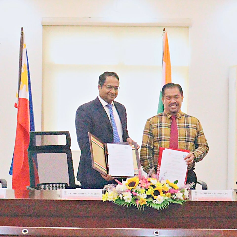 INDIA Ambassador to the Philippines Shambhu Kumaran with Batangas State University president Dr. Tirso Ronquillo.