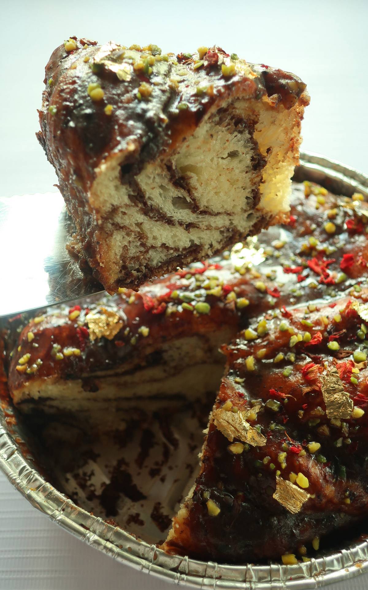 Chef Dennis Hipolito's EnsayBabka has beautiful swirls of chocolate characteristic of a babka.