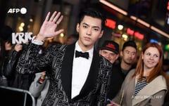 Chinese-Canadian ex-pop star Kris Wu jailed for rape
