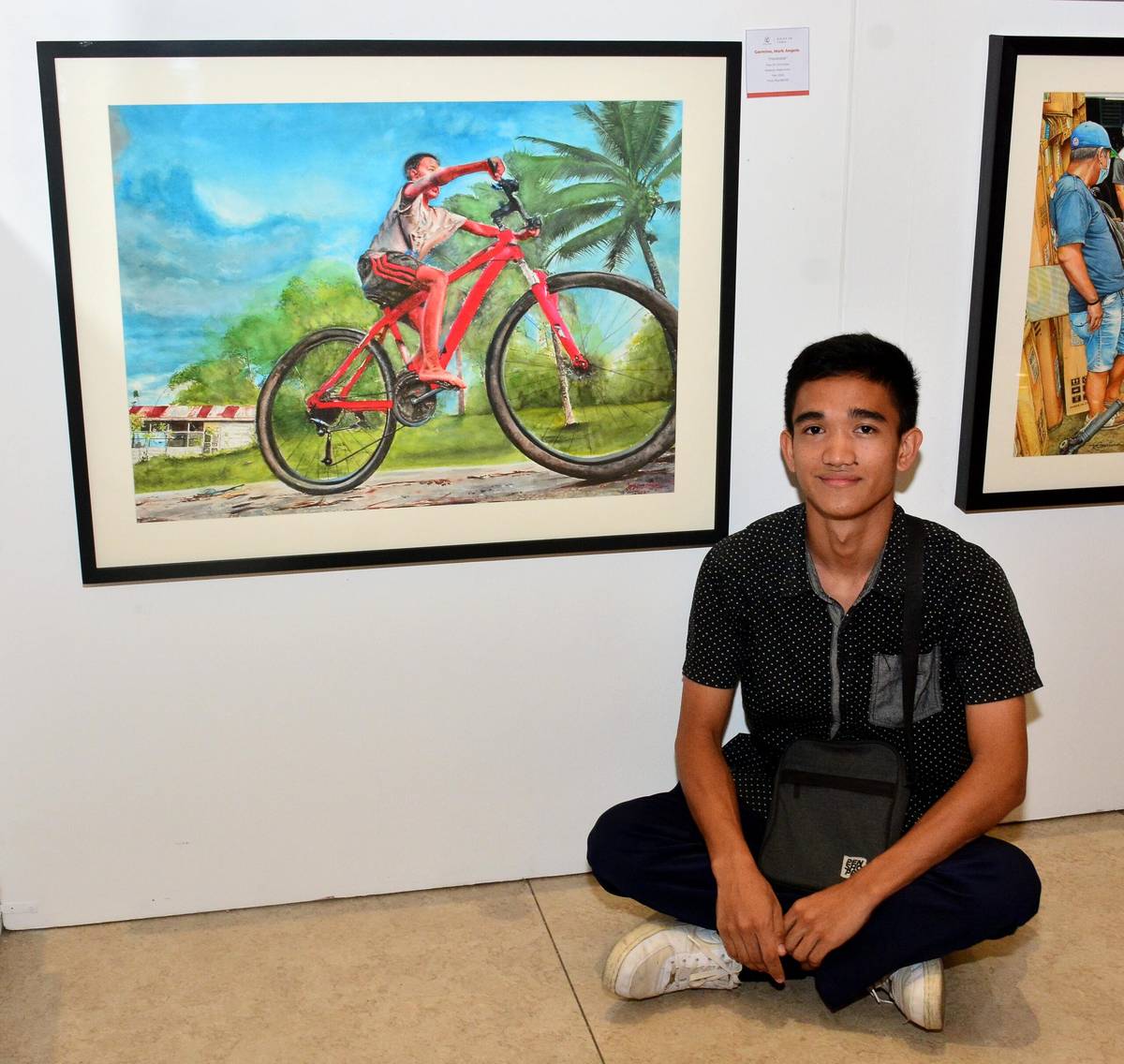Watercolorist Mark Angelo Garmino and his artwork titled 'Inevitable.'