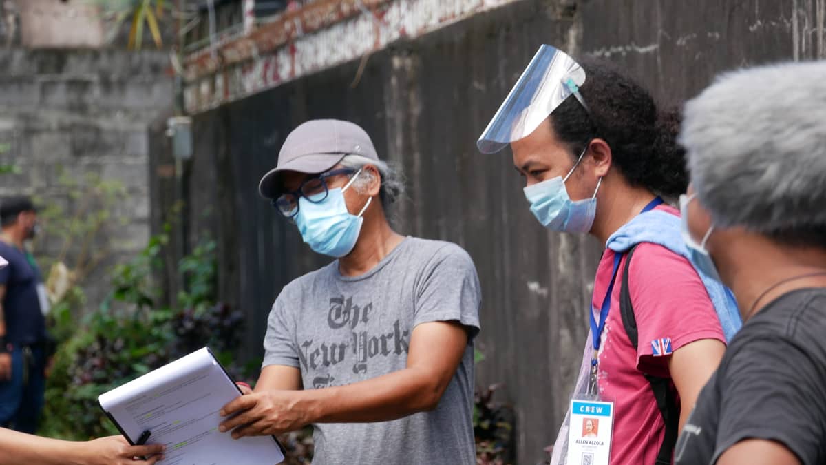 FILMMAKER Lav Diaz at work.