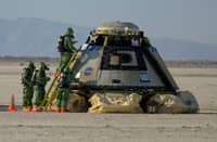 BOEING and NASA teams work around the CST-100 Starliner spacecraft after it landed at White Sands Missile Range’s Space Harbor early this year. The spacecraft’s first manned flight had been hit by one glitch after another, causing its reset. | BILL INGALIS/NASA/Agence france-presse
