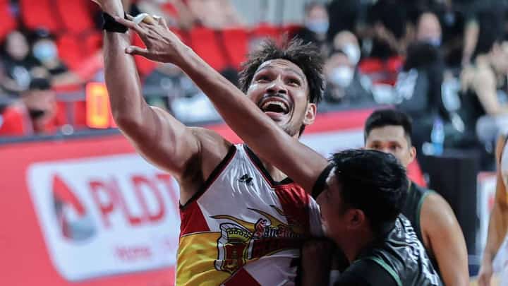 Terrafirma’s Aldrech Ramos fails to stop an overpowering June Mar Fajardo of San Miguel Beer in this bit of action in the Philippine Basketball Association Commissioner’s Cup Wednesday at the Philsports Arena. Photo by Rio Deluvio