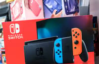 A box of Nintendo Switch video game console is displayed at the self of video games and accessories at the gaming section of a shop in Tokyo. Photo by Philip FONG / AFP