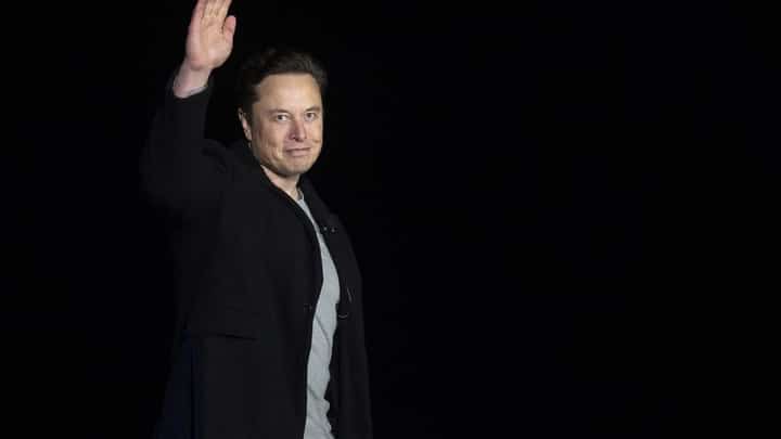 In this file photo taken on February 10, 2022 Elon Musk gestures as he speaks during a press conference at SpaceX's Starbase facility near Boca Chica Village in South Texas. Photo by JIM WATSON / AFP