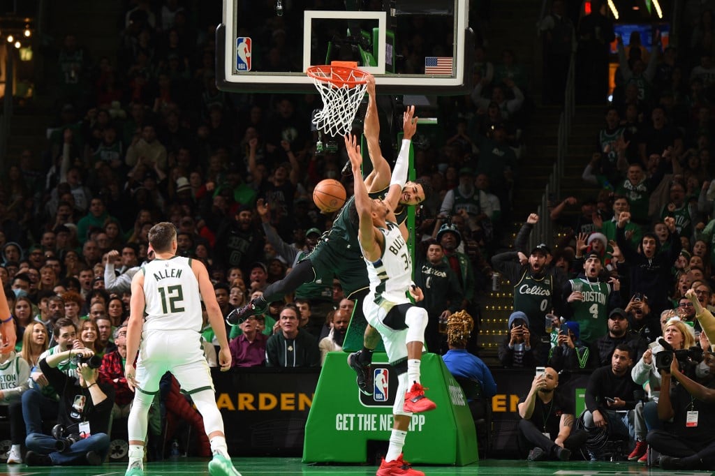 Tatum leads NBA-best Celtics over Bucks while 76ers, Mavs win