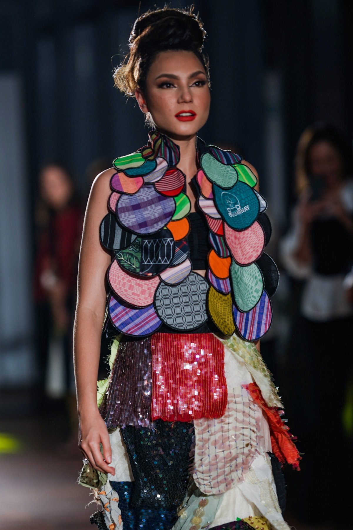 A PAMPINAY piece showcased on the runway.