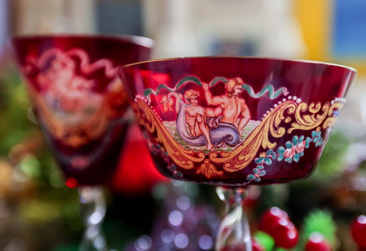Red crystal goblets ready for a champagne toast