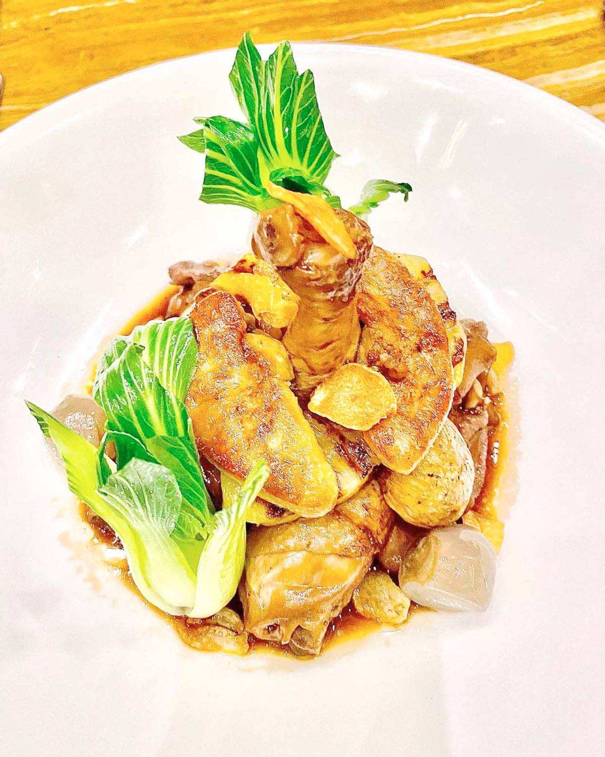 PHOTOGRAPHS BY TED MONTELIBANO FOR THE DAILY TRIBUNE<br />Haliya's twice-cooked Chicken Adobo with Foie Gras.