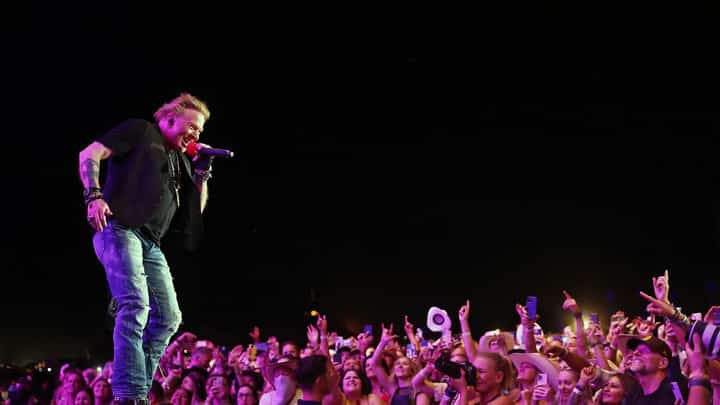 Axl Rose of Guns N' Roses. In a lawsuit filed in Los Angeles, attorneys for the band said a corporation that runs the online shop was conning consumers into believing the business had something to do with the rock band. (Photo by AMY SUSSMAN / GETTY IMAGES NORTH AMERICA / Getty Images via AFP)