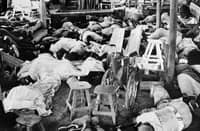 (Graphic content) This file photo taken on 19 November 1978 shows bodies of more than 400 members of the Jim Jones' sect "Temple of people" in Jonestown, Guyana. Deep in the Guyanese jungle, only a signpost and a nondescript plaque serve as memories of a cult settlement where one of the most spine-chilling mass murder-suicides in modern history took place almost five decades ago. (Photo by AFP)