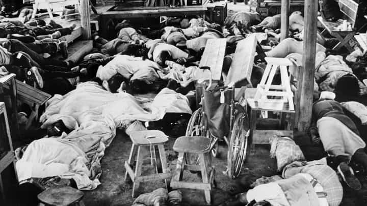 (Graphic content) This file photo taken on 19 November 1978 shows bodies of more than 400 members of the Jim Jones' sect "Temple of people" in Jonestown, Guyana. Deep in the Guyanese jungle, only a signpost and a nondescript plaque serve as memories of a cult settlement where one of the most spine-chilling mass murder-suicides in modern history took place almost five decades ago. (Photo by AFP)