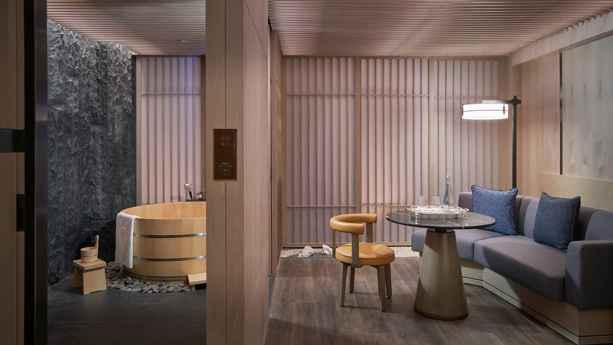 Hotel Okura Manila's Hinoki-yu room bath and seating.