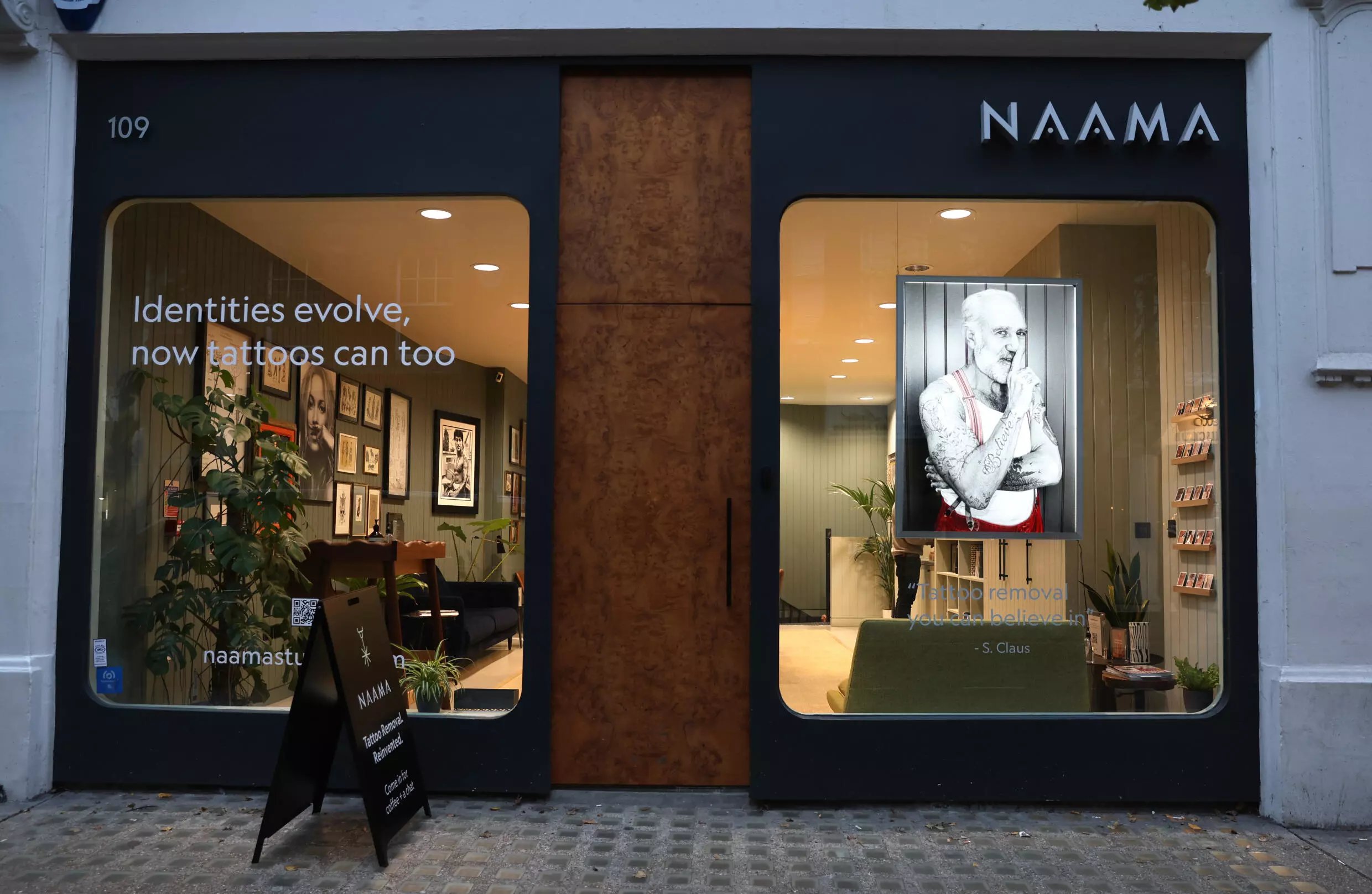 NAAMA Studios in London's upmarket Marylebone district is doing the tattoo removal for free. (Photo by ISABEL INFANTES / AFP)