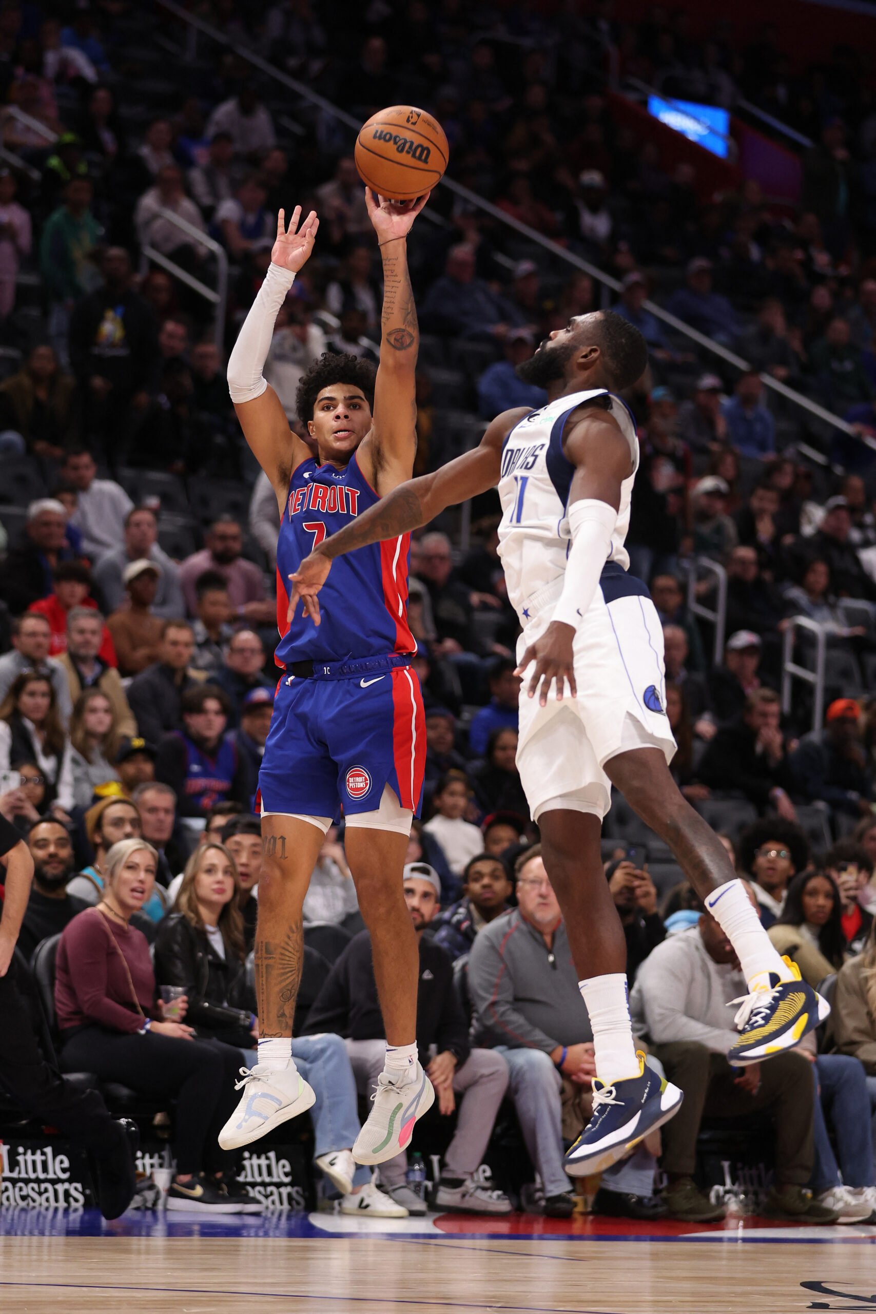 Killian Hayes of the Detroit Piston lights up the scoreboard against the Dallas Mavericks in NBA action yesterday. Detroit won, 131-125, in overtime. | GREGORY SHAMUS/AGENCE FRANCE-PRESSE