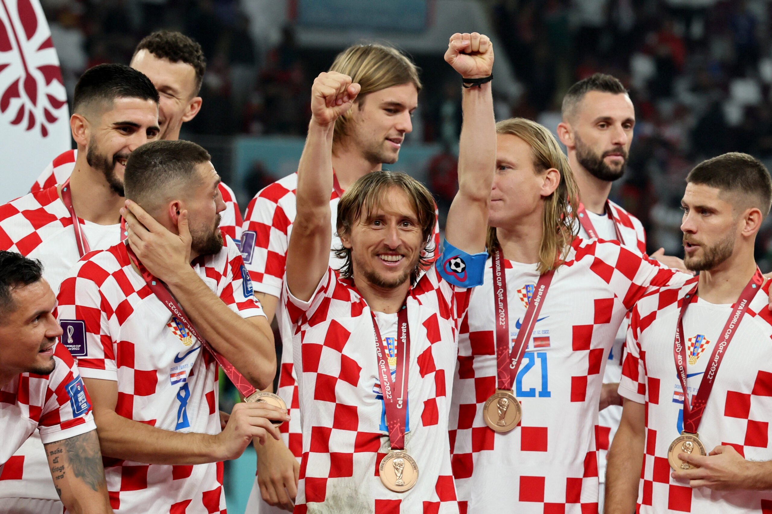 JACK GUEZ/AGENCE FRANCE-PRESSE
Luka Modric and the Croatian team celebrate their third-place finish in the World Cup in Doha, Qatar. Croatia beat Morocco, 2-1.