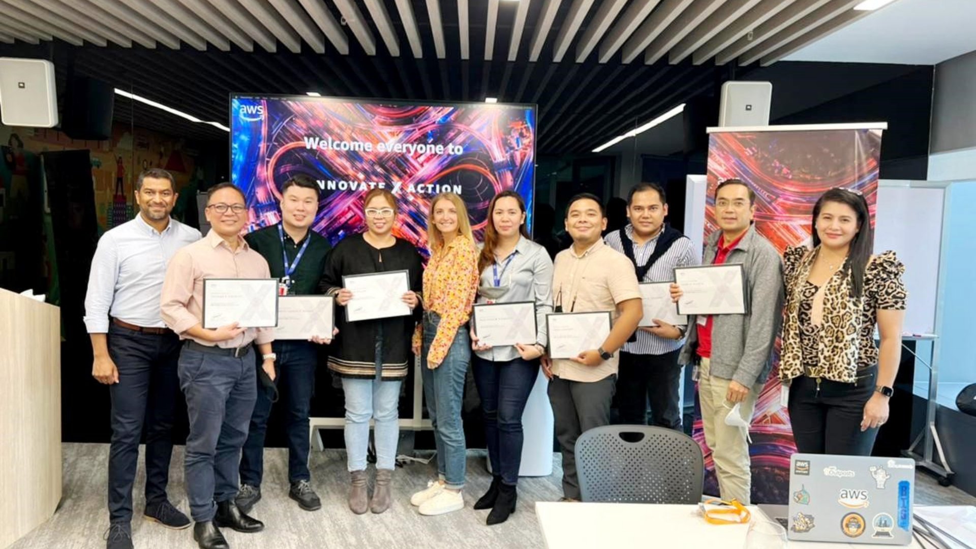 The Phoenix Petroleum team led by chief digital officer Charlie Valerio (2nd from right) receives the Amazon Web Services Innovate X Action accelerator award from AWS Innovation Programs Lead ASEAN Reuben Jayasinghe, Growth Lead Innovation Programs APJ Chiara Longhi, and Account Manager Lea Delos Reyes | PHOTOGRAPH COURTESY OF PHOENIX PETROLEUM