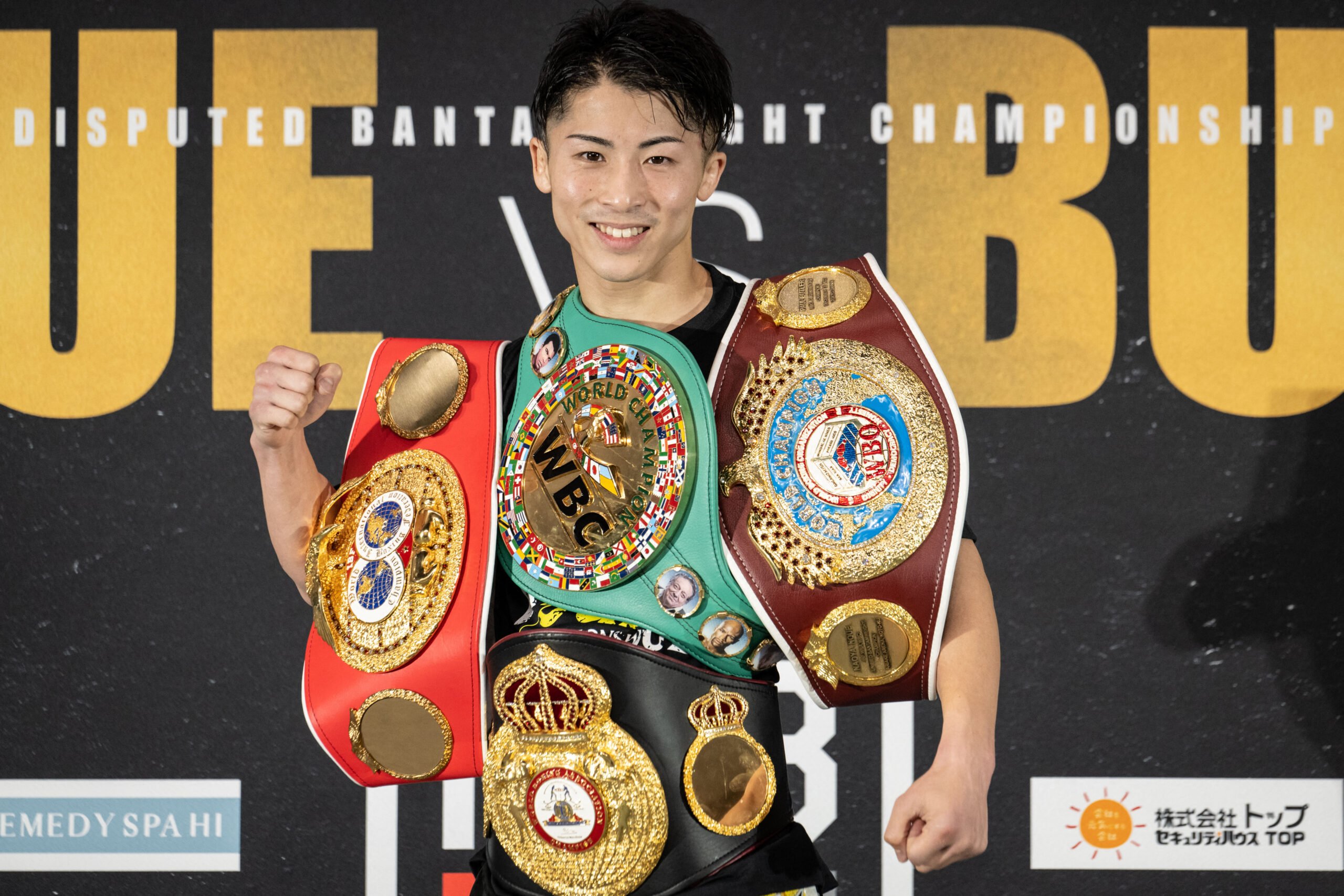 Japan's Naoya Inoue poses for a photograph during a press conference after beating Britains Paul Butler in his bantamweight title unification match in Tokyo on December 13, 2022. (Photo by Yuichi YAMAZAKI / AFP)