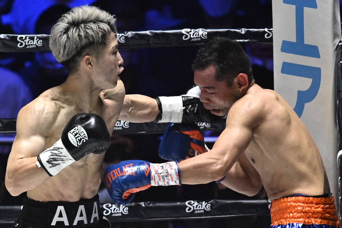 PHILIP FONG/agence france-presse<br />NONITO Donaire Jr. (right) gets punished by the heavy blows of Naoya Inoue of Japan in their WBC bantamweight battle.