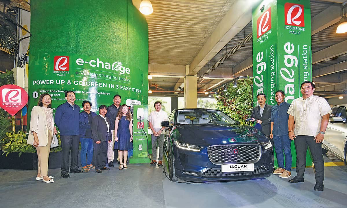 KEY executives from Meralco, the Department of Energy, the Department of Transportation, the Quezon City local government and Robinsons Land Corporation pose for a photo during the launch of an EV charging station at Robinsons Galleria. Meralco is one of the leading supporters of the country's important shift toward sustainable transportation.