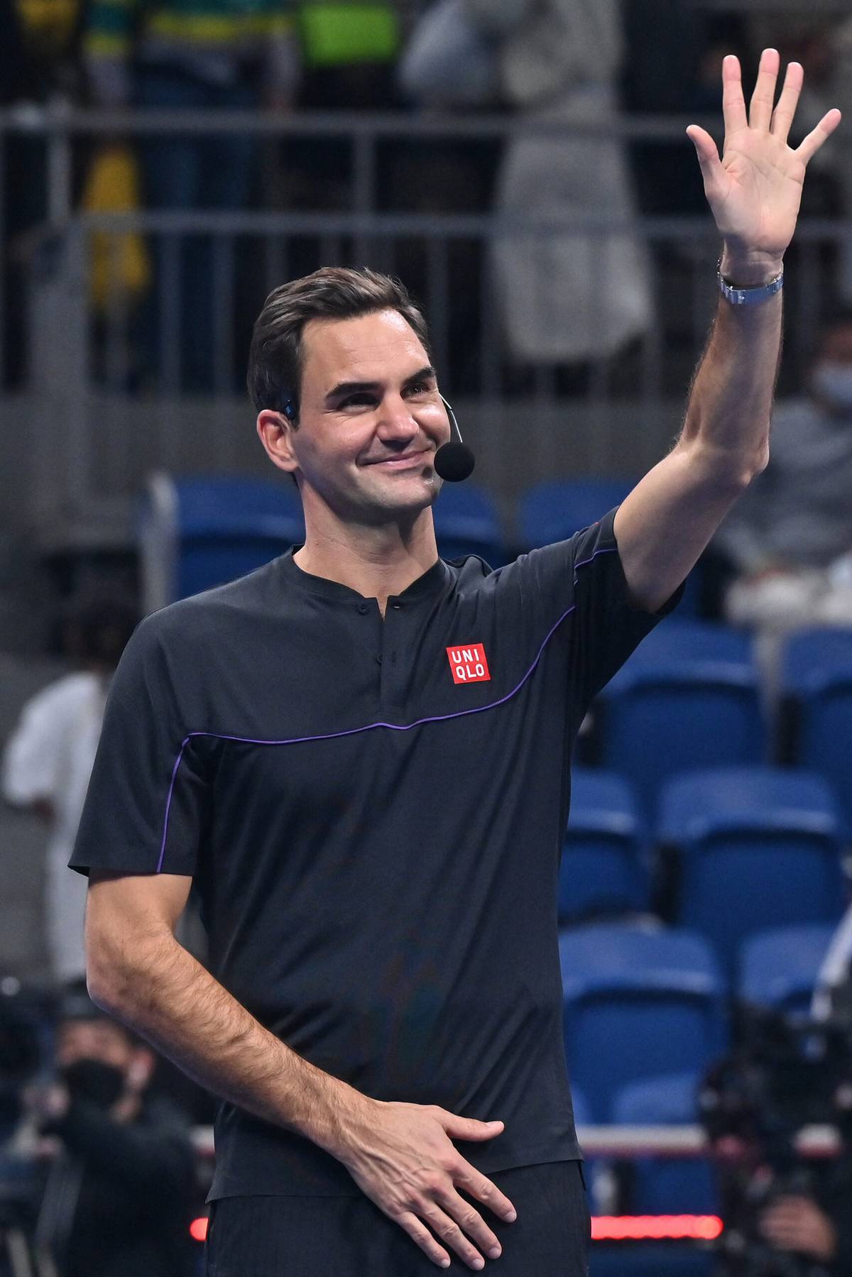 RICHARD A. BROOKS/AGENCE FRANCE-PRESSE<br />ROGER Federer bids tennis goodbye.