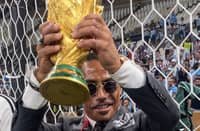 Salt Bae, whose real name is Nusret Gokce, was pictured holding and kissing the trophy after Argentina beat France in Sunday's final in Qatar. (Photo: @nusr_et / Twitter)