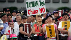 Taiwan premier slams China over new import bans