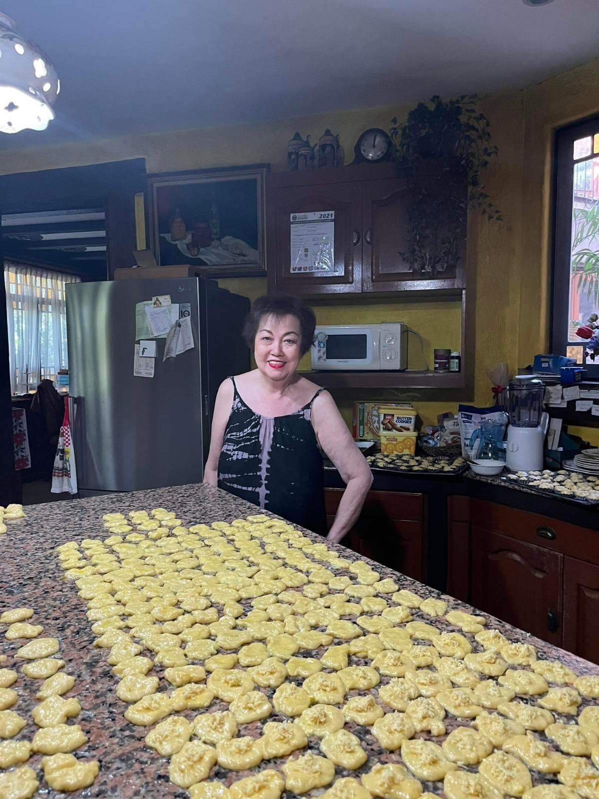 Presiding over a kitchen full of enseimaditas.