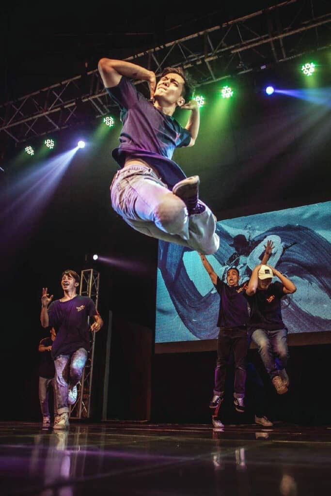 The athlete performs in front of an eager audience