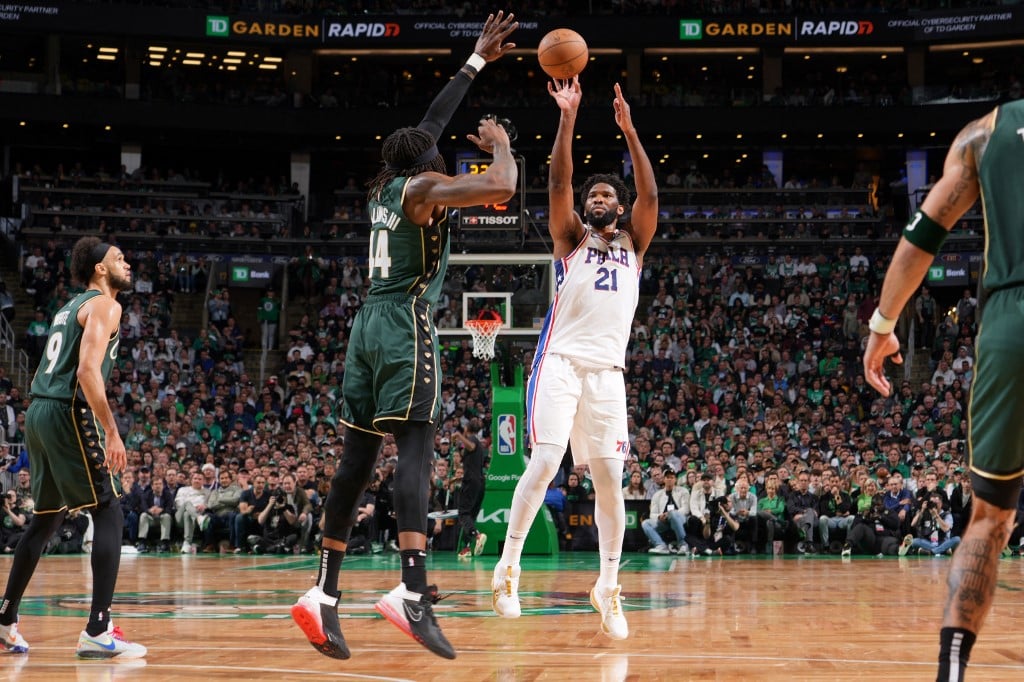 Joel Embiid #21 of the Philadelphia 76ers shoots a three point basket during the game against the Boston Celtics during Game 5 of the 2023 NBA Playoffs Eastern Conference semi-finals on May 9, 2023 at the TD Garden in Boston, Massachusetts. Photo by Jesse D. Garrabrant / NBAE / Getty Images / Getty Images via AFP