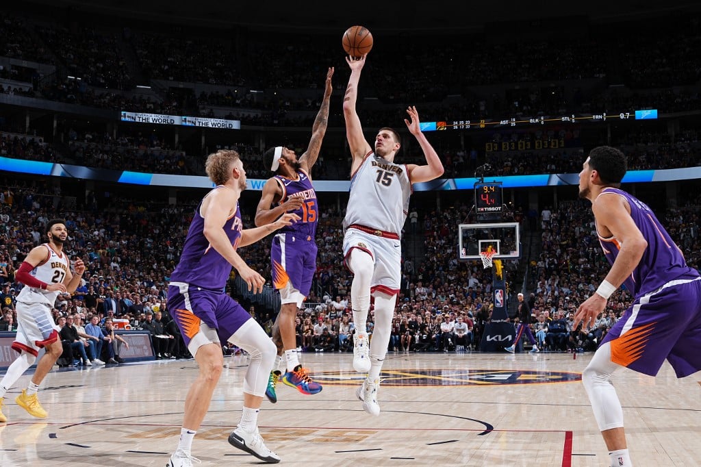 Nikola Jokic #15 of the Denver Nuggets shoots the ball during Round 2 Game 5 of the Western Conference Semi-Finals 2023 NBA Playoffs against the Phoenix Suns on May 9, 2023 at the Ball Arena in Denver, Colorado. Photo by Garrett Ellwood / NBAE / Getty Images / Getty Images via AFP