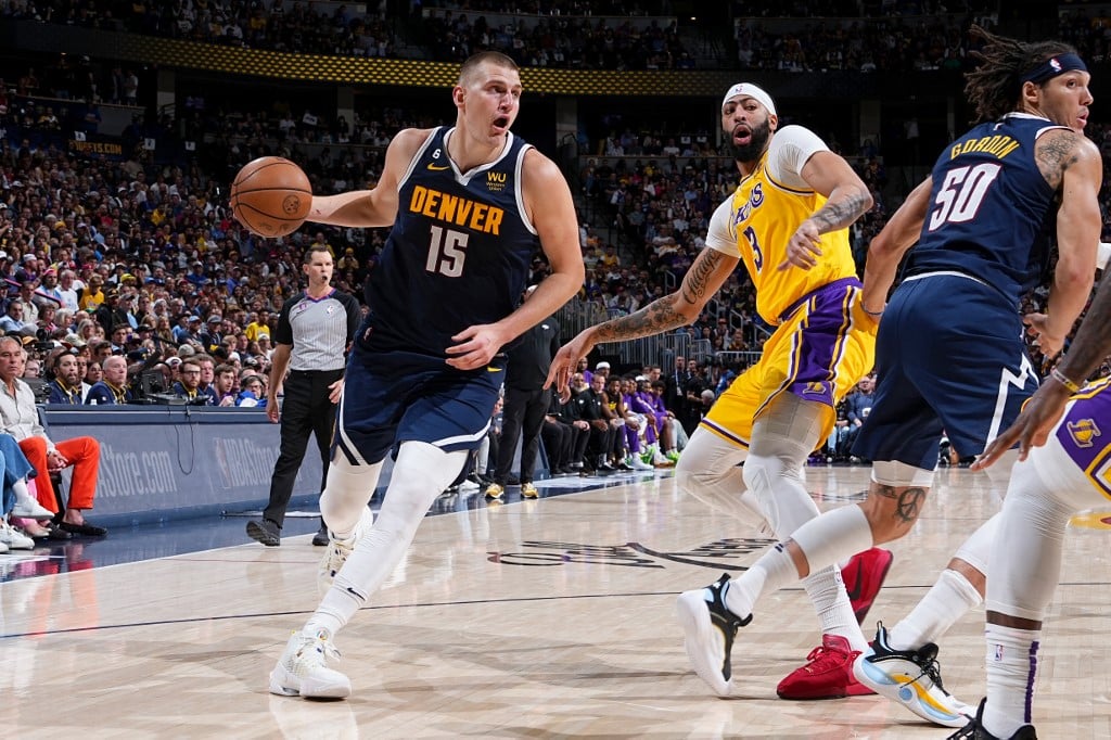 Nikola Jokic #15 of the Denver Nuggets dribbles the ball during the game against the Los Angeles Lakers during Game 2 of the 2023 NBA Playoffs Western Conference Finals on 18 May at the Ball Arena in Denver, Colorado. Photo by Garrett Ellwood / NBAE / Getty Images / Getty Images via AFP