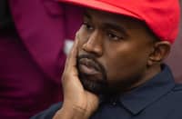 (FILES) Kanye West meets with US President Donald Trump in the Oval Office of the White House in Washington, DC, 11 October 2018. A photographer who claims Kanye West threw her cell phone to the ground in a confrontation is suing the troubled rapper for assault, she said 1 June 2023.
Nichol Lechmanik said the artist, who is now formally known as Ye, caused her "great mental and emotional pain" in the January confrontation. (Photo by SAUL LOEB / AFP)