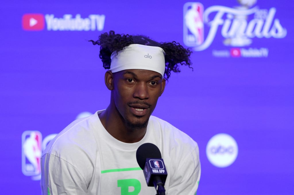 Jimmy Butler #22 of the Miami Heat fields questions during Media Day before Game One of the NBA Finals against the Denver Nuggets at Ball Arena on 31 May 2023 in Denver, Colorado.