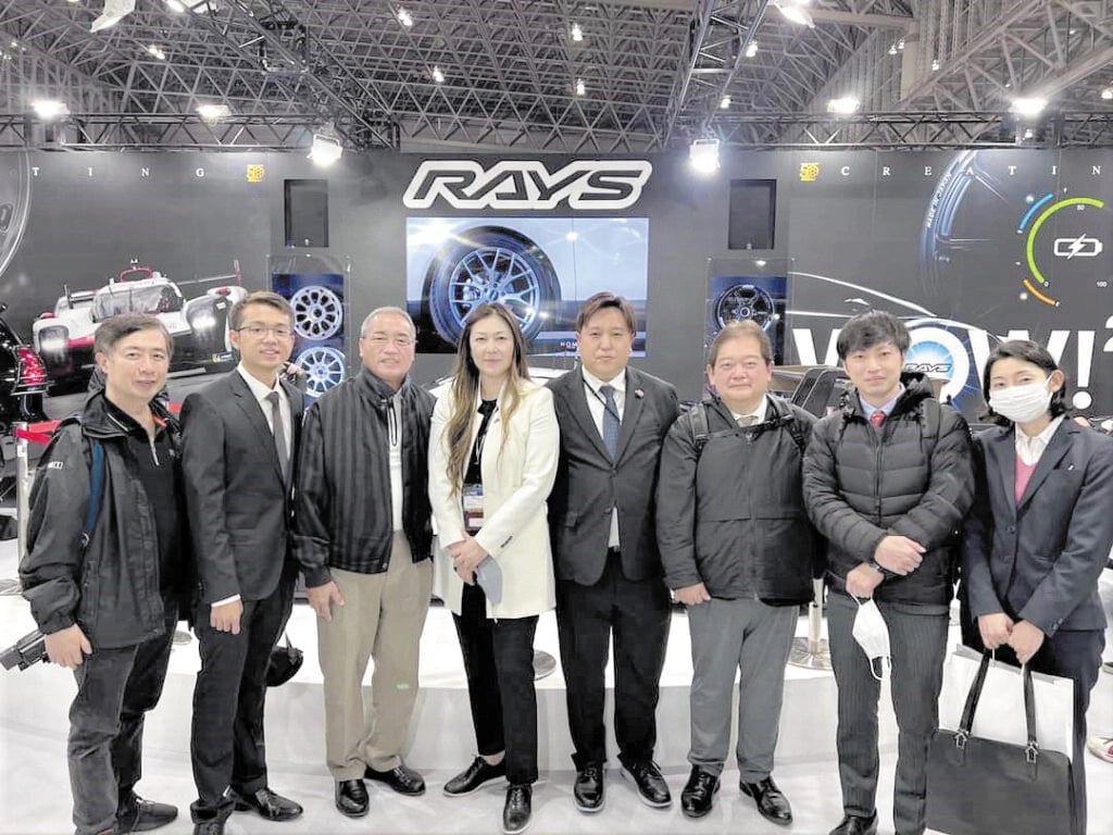 PEOPLE behind Autoplus: Carlos Gono (3rd from left), with his son Luis (2nd from left), and Jun Go (leftmost) with Rays Engineering executives at the Tokyo Auto Salon.