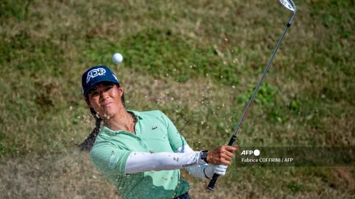 FRANCE’S Celine Boutier gets out of the bunker but threat awaits in the form of two major winners. | FABRICE COFFRINI/AGENCE FRANCE-PRESSE