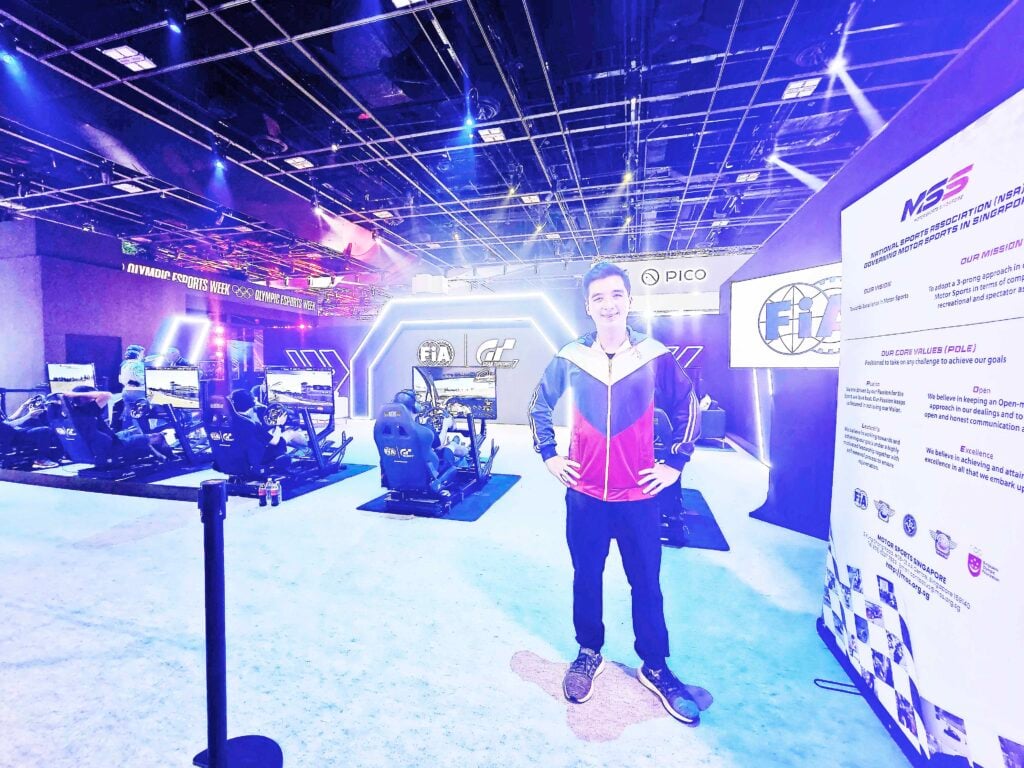 IÑIGO Anton with the pro-level sim-racing rigs used for the FIA-sanctioned e-Olympics Motorsports event.<br />Photographs courtesy<br />of Karen Anton