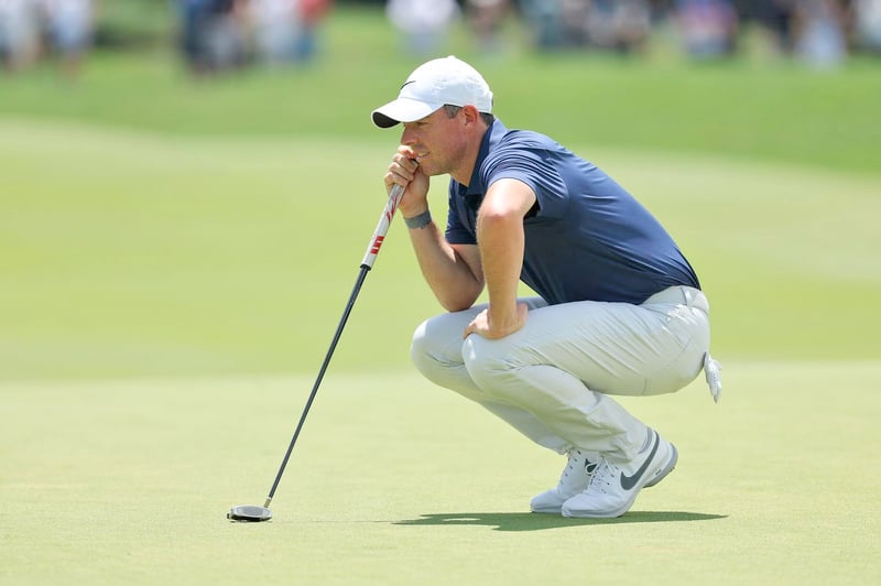 McIlroy complains as Harman pulls away