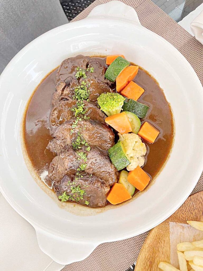 Pot roast beef braised in red wine.